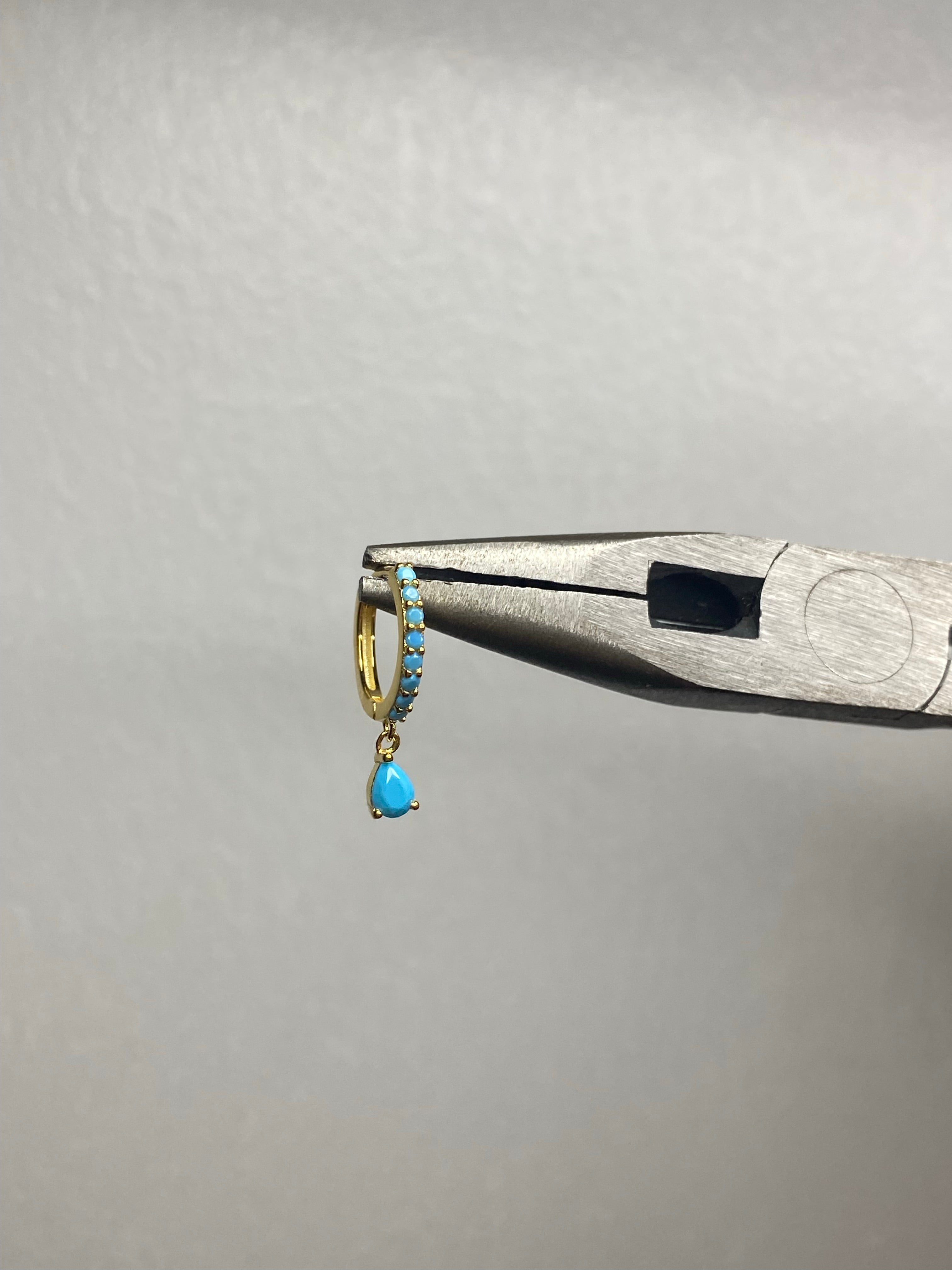 gold blue dangling gem huggie (sold seperately)