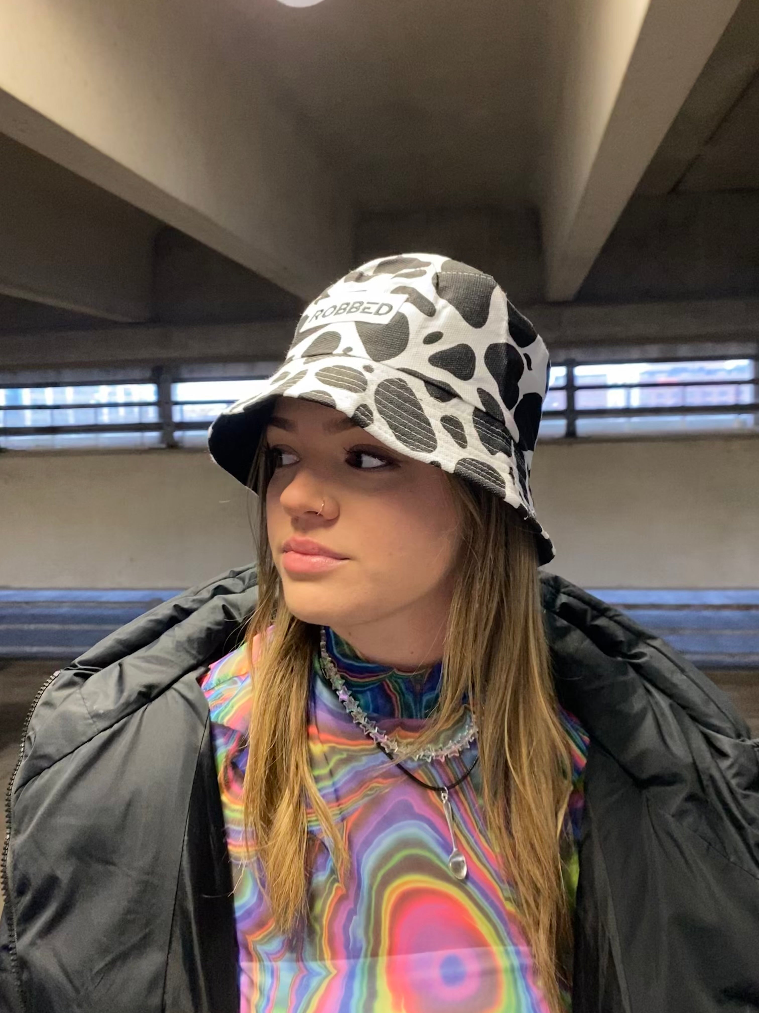 Cow print ‘ROBBED’ bucket hat🐮