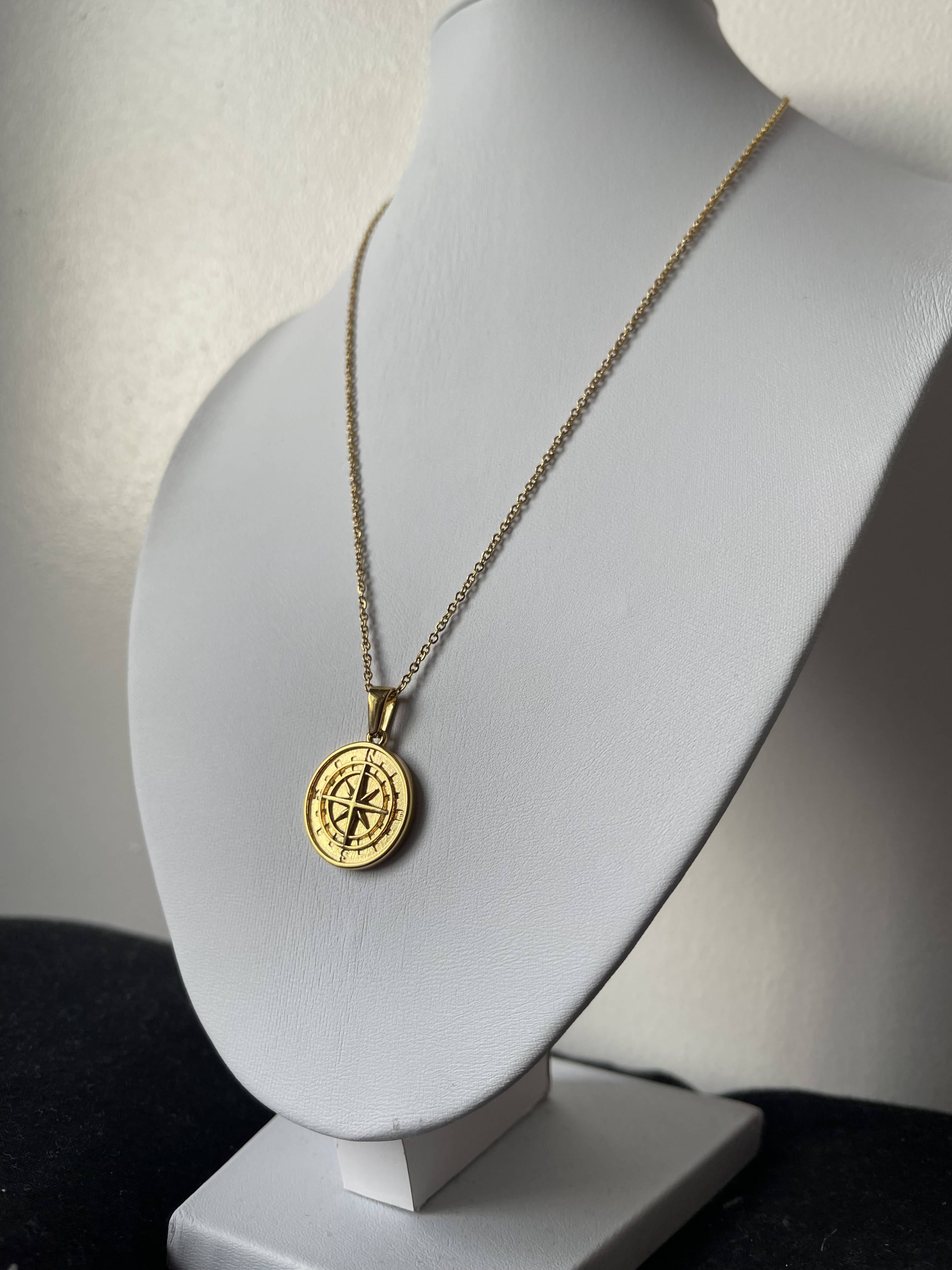 Gold compass pendant necklace